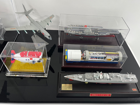 Model ships and aircraft displayed together